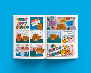 Comic strip in magazine with cartoon characters on a blue background