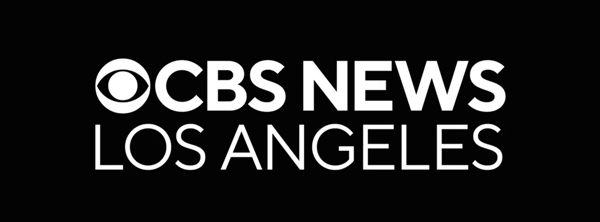CBS News Los Angeles logo in white text and eye emblem on a solid black background.