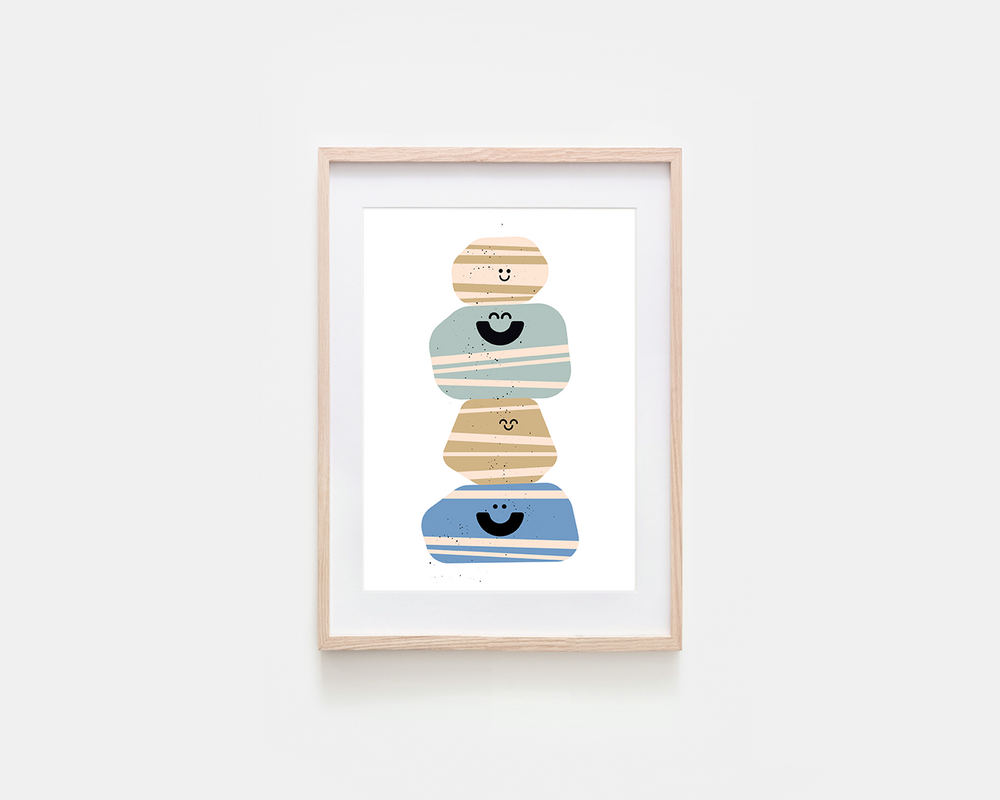 A framed art print featuring a minimalist illustration of four stacked, striped, smiling shapes in beige, light blue, tan, and blue, set in a light wood frame against a white background.