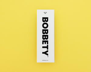 Bookmark with 'BOBBETY' branding on a yellow background