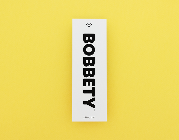 Bookmark with 'BOBBETY' branding on a yellow background