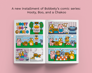 An open comic book spread titled 'Hooty Boo Chakoo' on a pink background. The comic features cute cartoon animals in a kitchen and dining setting, with text above reading 'A new installment of Bobbety's comic series: Hooty, Boo, and a Chakoo.
