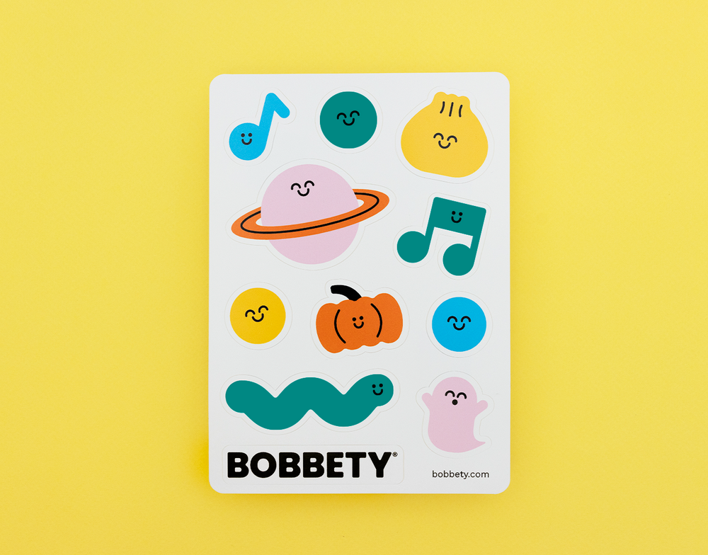 Colorful cartoon stickers on a yellow background